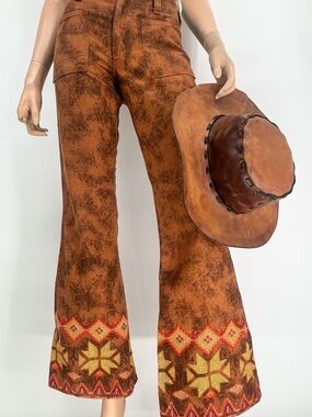 True vintage Maverick denim flares with faux embroidered hem